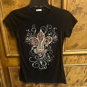 Elegant Black Tee with Fleur-de-Lis Design